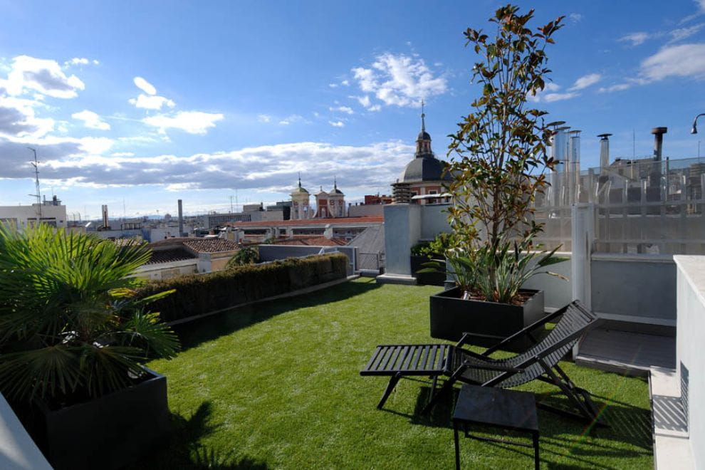 diseño de terraza en atico a doble altura